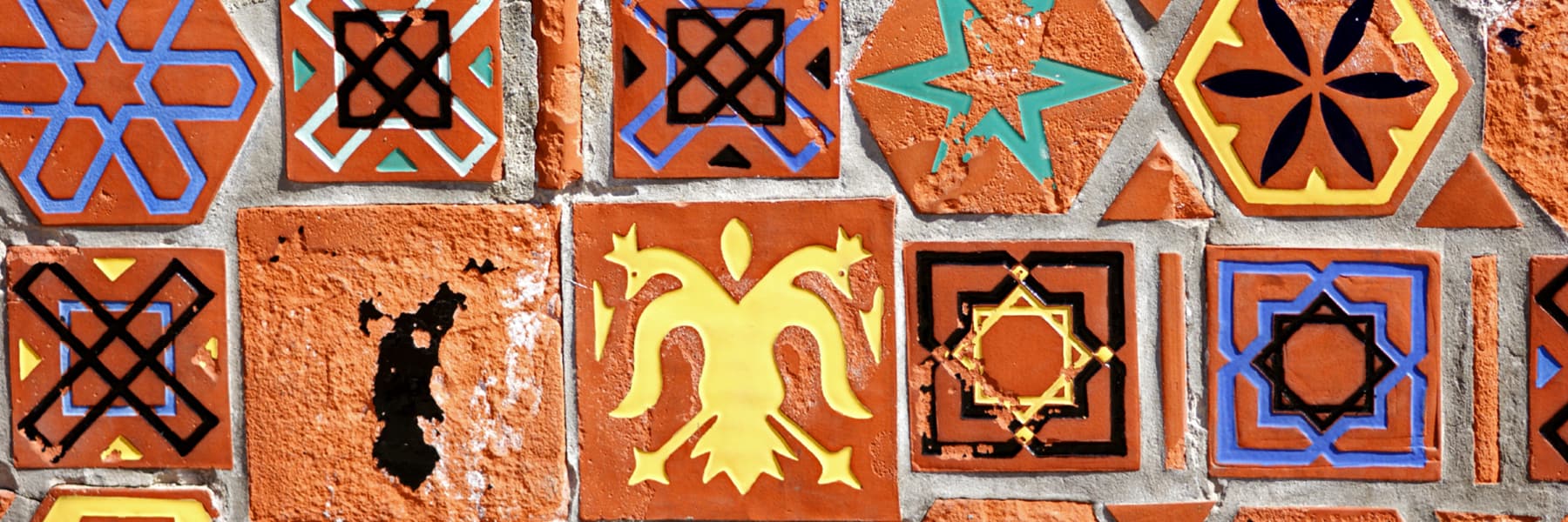 Latin American & Iberian Studies tiles on a wall.