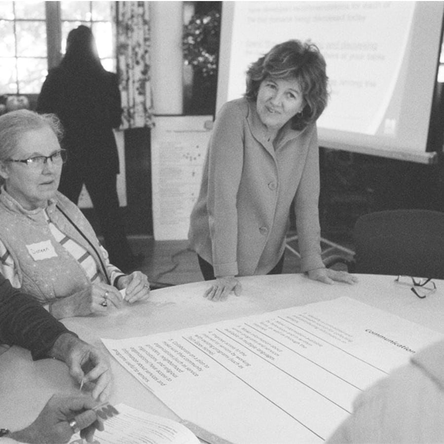 Jan Mutchler meets with seniors at the German Center in 2012.