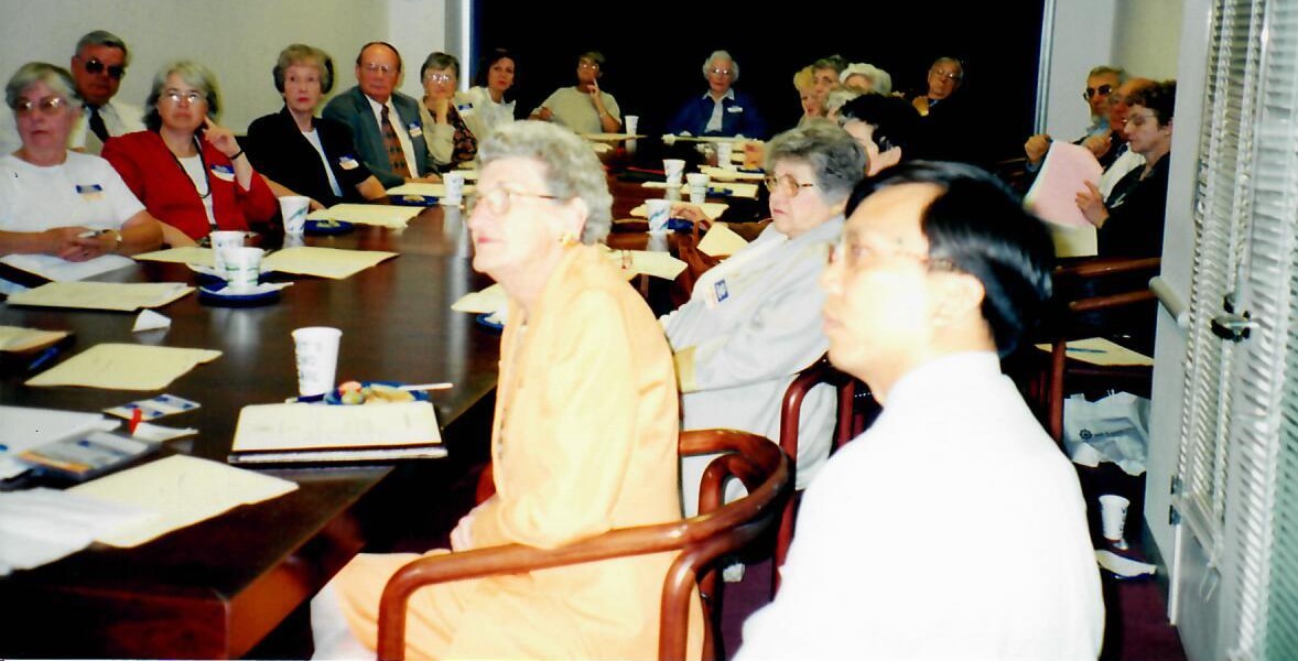 Group picture of people meeting for the first time to organize a lifelong learning group at UMass Boston.